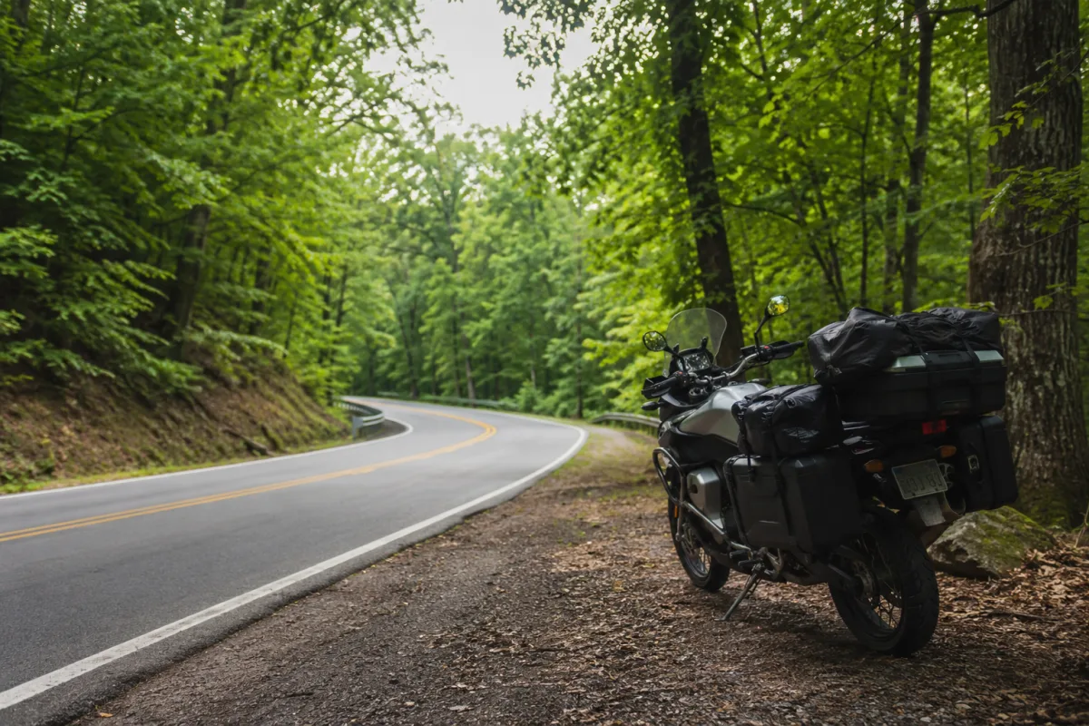 Motorcycle on a curving Hocking Hills road