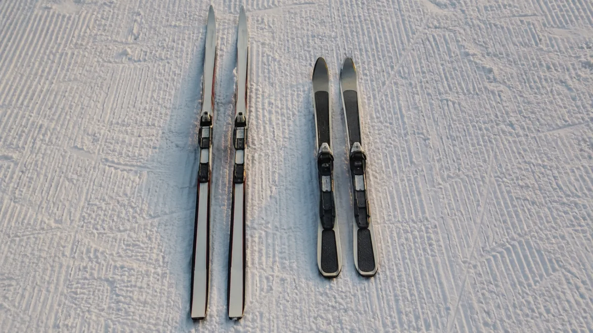 Classic and skate cross country skis side by side