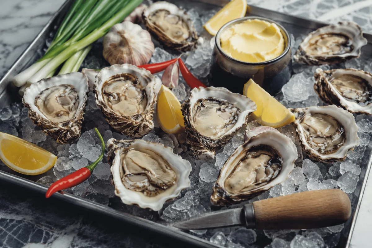 Spicy oyster ingredients with chile garlic butter