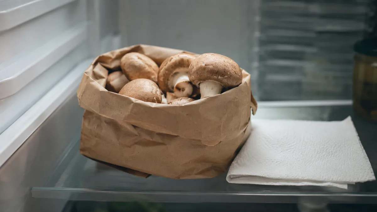 Mushrooms stored in a paper bag